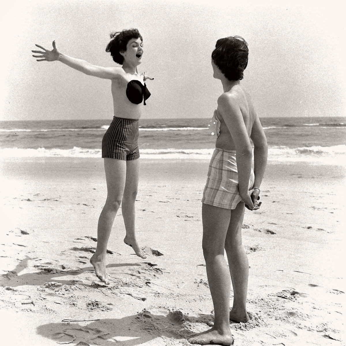 In May 1949, Charles L. Langs announced a daring innovation in beachwear: a  pair of bra cups a woman could affix to her breasts with an adhesive. His  idea was to use